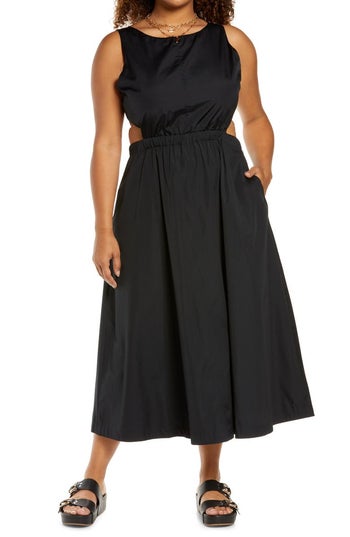 model wearing black dress