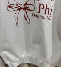 The same sweatshirt after cleaning and washing to demonstrate the effectiveness of the cleaning product