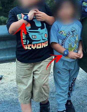 reviewer's children wearing wristbands containing airtags
