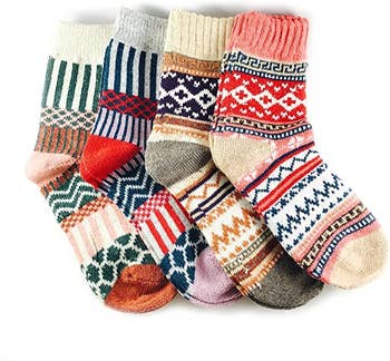 the wool crew socks in four colorful patterns