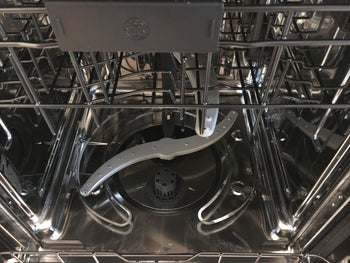 reviewer after image of the same dishwasher now clean