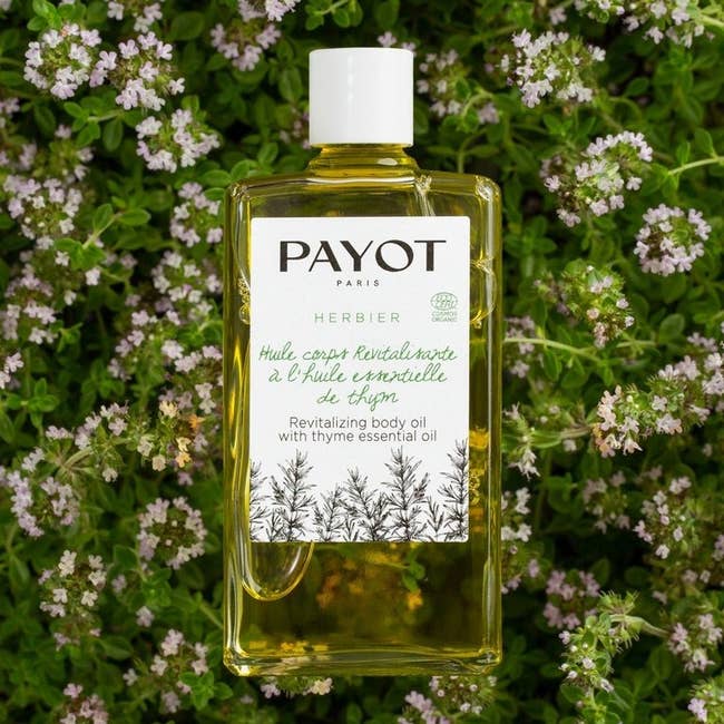 payit body oil bottle with thyme essential oil