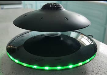 Levitating speaker with green LED 