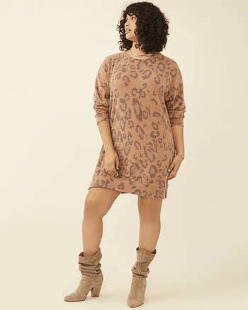 model wearing beige cheetah print sweater dress
