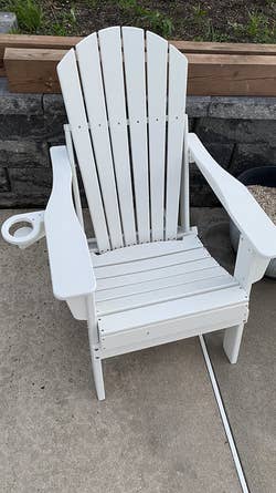 another reviewer's white Adirondack chair showing the cup holder