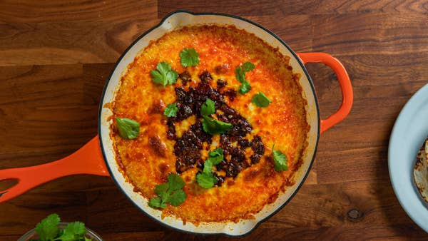 Queso Fundido With Chorizo And Poblano Peppers
