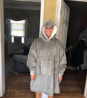 reviewer wearing gray comfy