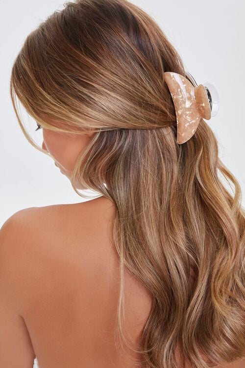 model wearing the champagne colored clip