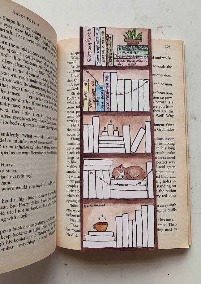 an open book with the book-tracking bookmark inside