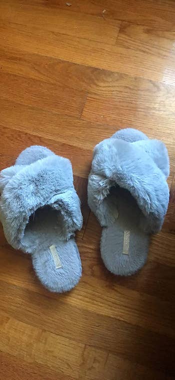Reviewer's grey faux-fur slippers