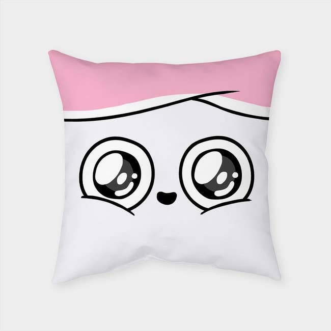 the square pillow with a close up on cuppy with wide shining eyes, looking at your proudly