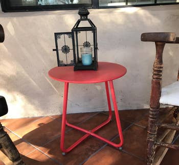 Image of the red outdoor side table