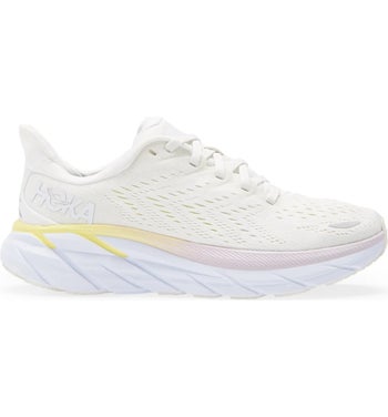side view of the white, pink, and yellow sneaker