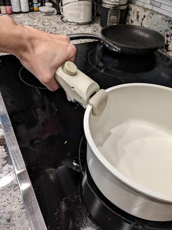 The reviewer with the handle on the pot