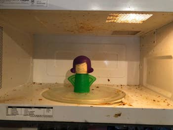 Reviewer's microwave before using cleaner