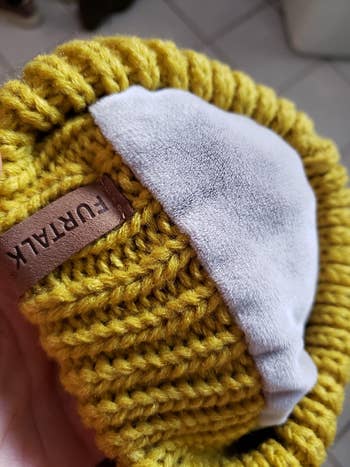 Reviewer image of close up of product in yellow with white fleece interior shown