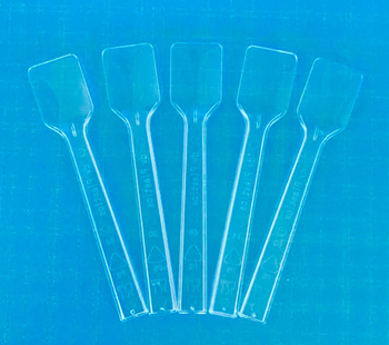 Five clear mini spatulas