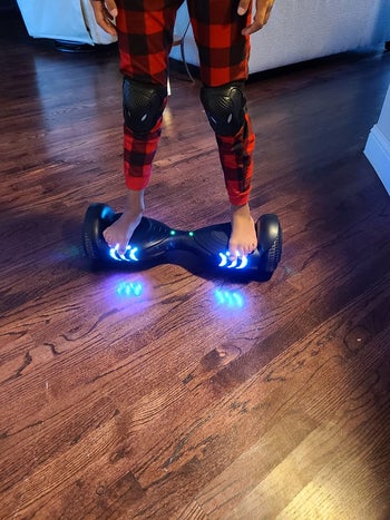Reviewer photo of a child riding the hoverboard