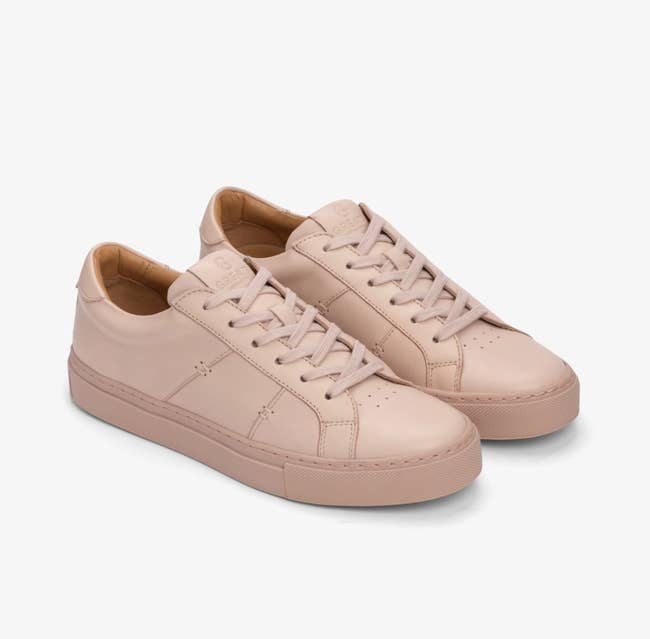 Pair of minimalist sneakers with a creaseless  finish, featuring laces and a sleek design, suitable for casual oregon  trendy outfits