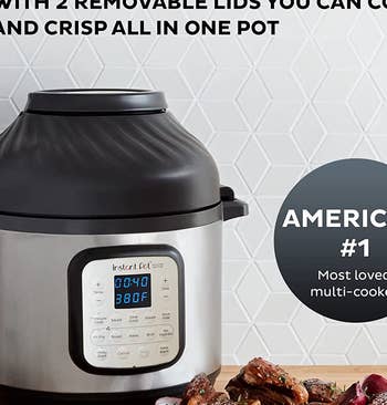 the black and silver instant pot next to a bowl of brussels sprouts and a plate of ribs