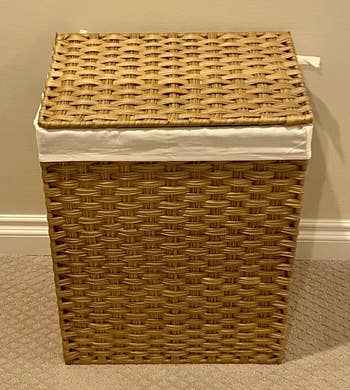 Reviewer image of light brown laundry hamper