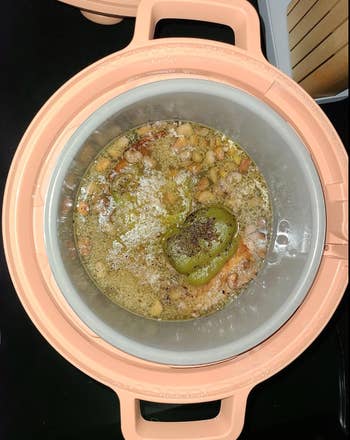 cooker with soup inside of it 