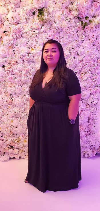 reviewer wearing the black maxi dress