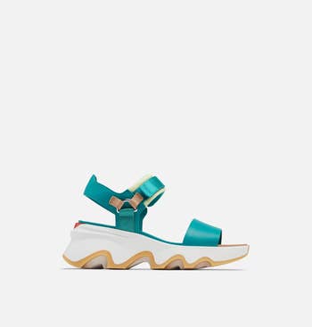 the sandals in turquoise and white