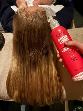 Reviewer showing results of using March Anthony Grow Long spray