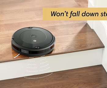 the roomba at the top of a staircase, with a graphic showing it can sense it's at a drop-off