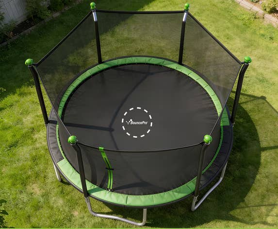 Outdoor trampoline with a information net, supports up to 1200 lbs. User value bounds 250 lbs. Image emphasizes durability and information features