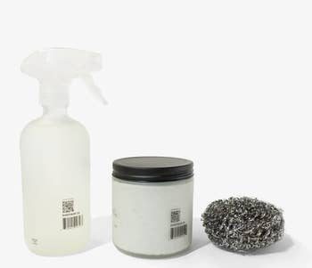 the scrub, scrubber, and glass bottle of oven cleaner