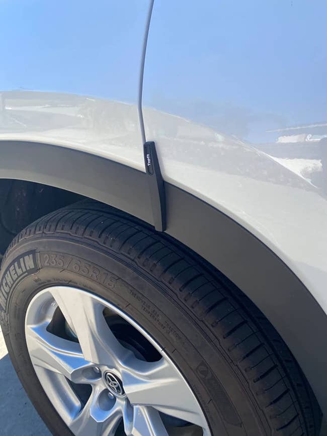 black edge guard on reviewer's silver toyota suv