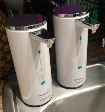 Reviewer image of two white dispensers 