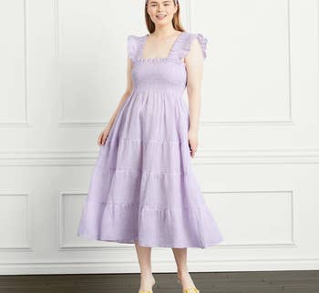 model wearing the lavender striped dress