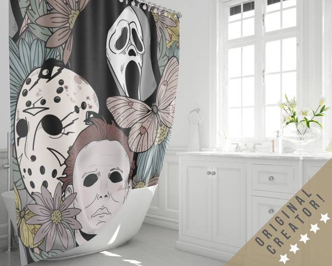 A shower curtain featuring with horror movie characters and butterflies