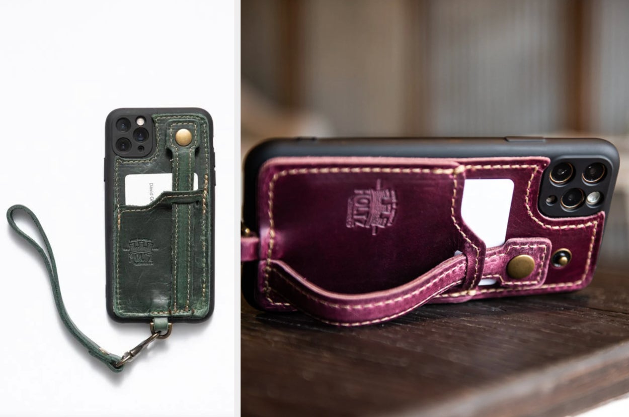 Green leather phone case with a hand strap attached by a gold snap, card holder, and hanging removable strap, product in red on top of a brown table