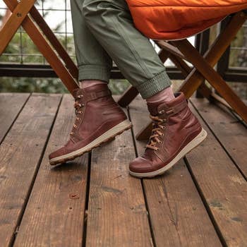 Instagram photo of model wearing red-brown boot sneaker