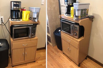 Reviewer image of light wooden microwave cart with microwave in nook and kitchen supplies on top shelf