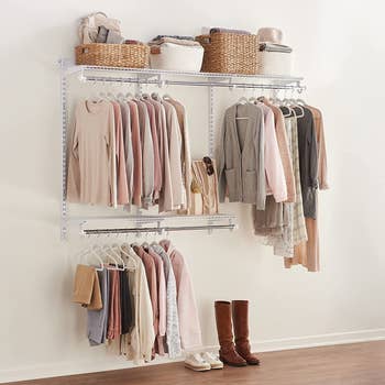lifestyle photo of the shelving system set up in a closet with clothes