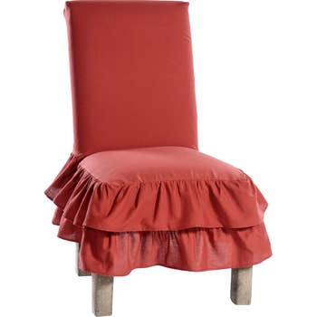 chair with red ruffled slipcover