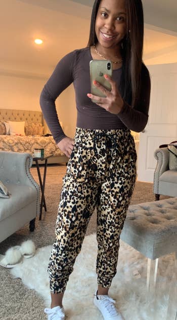another reviewer wearing the leopard leggings/joggers