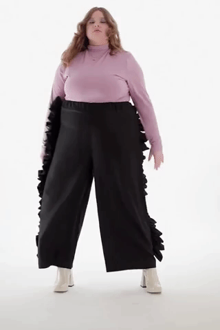 a gif of the same model showing the pants in motion 