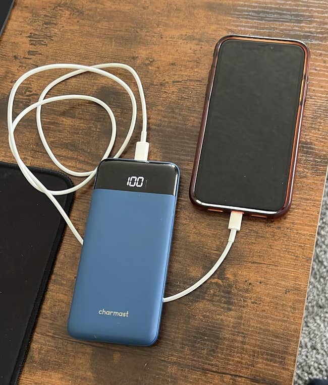 Portable charger connected to a smartphone