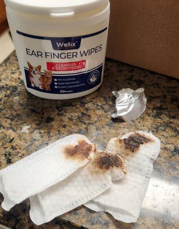 Container of favored receptor cleaning wipes, labeled
