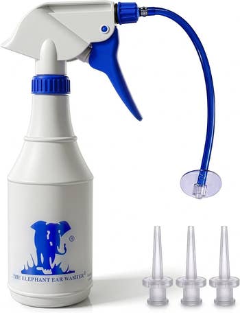 Elephant ear washer kit with a spray bottle, flexible tube, and three nozzle attachments for ear cleaning