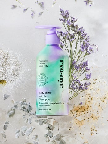 green and purple shampoo bottle