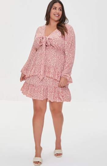 model wearing dress in pink with sandals