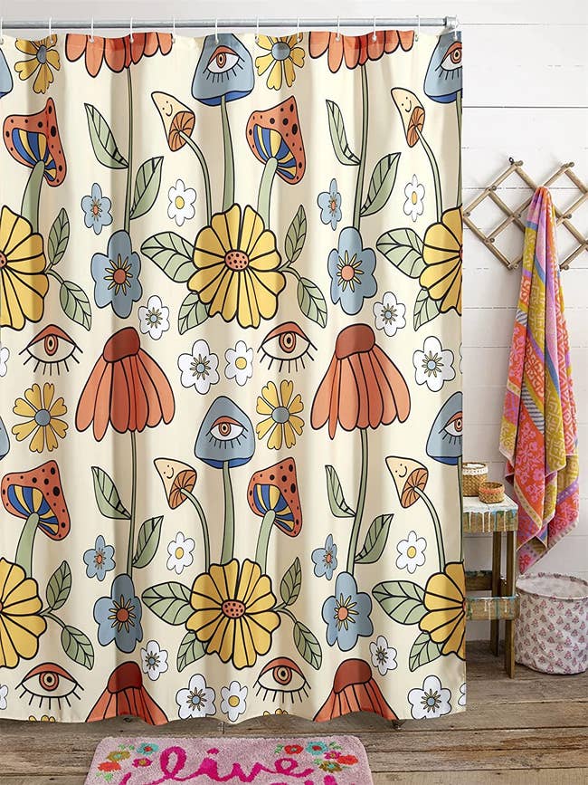 shower curtain with eyes flowers and mushroom pattern