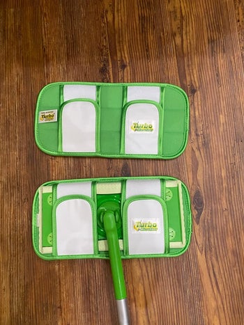 a reviewer showing the top of the pad attached to a Swiffer